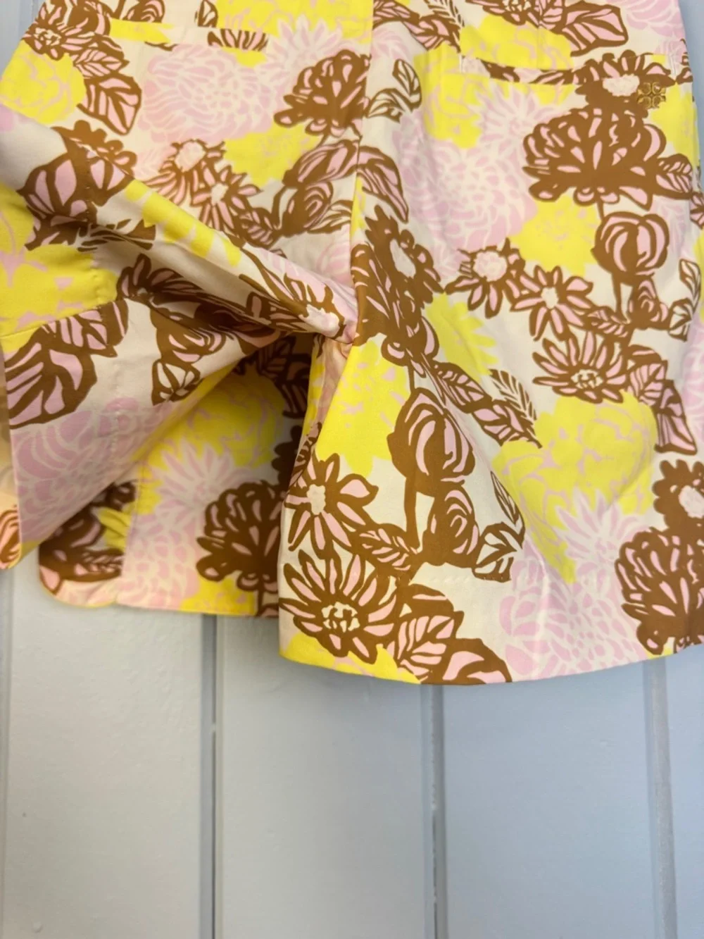 Tory Burch Tory Sport Printed Ruffle Golf Skort in French Crème Bouquet Pink